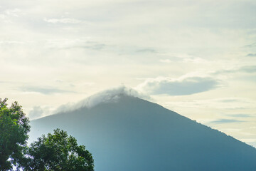 Ba Den mountain in cloud, Tay Ninh province, Vietnam. View from Dau Tieng lake.