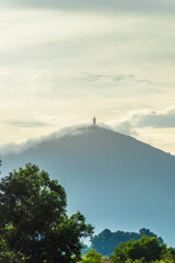 Ba Den mountain in cloud, Tay Ninh province, Vietnam. View from Dau Tieng lake.