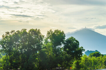Ba Den mountain in cloud, Tay Ninh province, Vietnam. View from Dau Tieng lake.