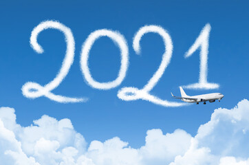 Happy New year 2021 concept travel on the background below cloudscape. Drawing by passenger...
