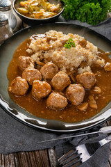 Minced meat balls in mushroom sauce.