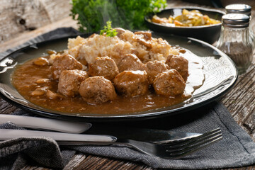 Minced meat balls in mushroom sauce.