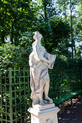Allegory of mercy in the summer garden. Petersburg