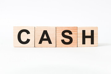 word CASH on wooden blocks, white background, business concept. business and Finance