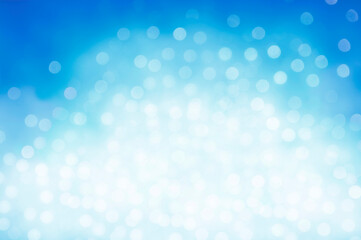 Christmas and New Year holidays blurred blue sparkles background, abstract background with bokeh defocused glittering lights and shadow