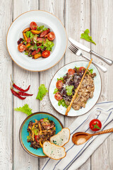 Top view of a cooked served dishes of restaurant's menu