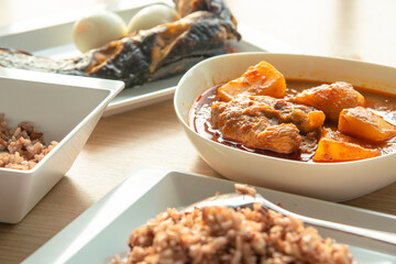 Thai Chicken massaman curry - Thai chicken and potato curry in coconut milk and herb eat with white rice
