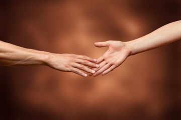 Hands of man and woman reaching to each other