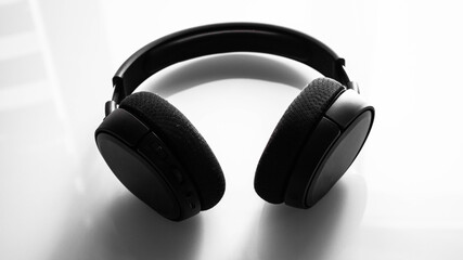 Fototapeta na wymiar Isolated black headphone on white background, on-ear headphones on white