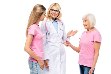 Doctor pointing with hand near women with ribbons of breast cancer awareness isolated on white