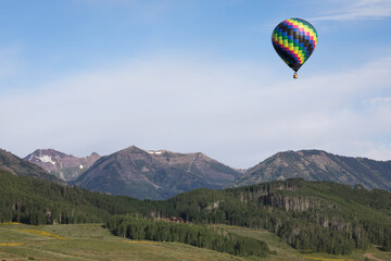 Hot Air Balloon over Mountains