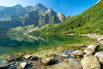 emerald Morskie Oko lake in High Tatra mountains in Poland - obrazy, fototapety, plakaty