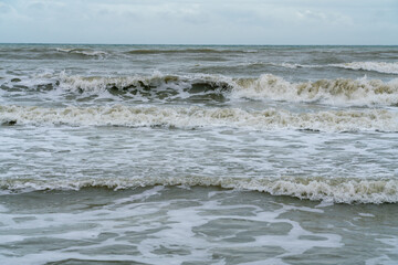 The  waves hit the shore at Ao Nang, Krabi, Thailand