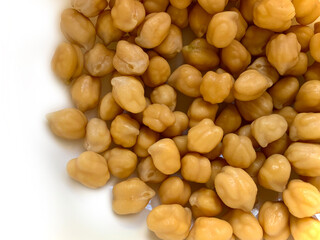 Garbanzo beans or pois chiche or chickpea spread on an isolated white background