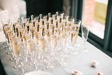 champagne glasses on table, wedding bar