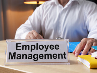 Employee Management is shown on the conceptual business photo