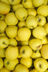 yellow apples in a market