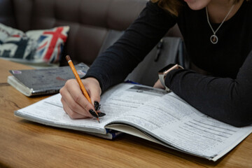 woman writing in notebook