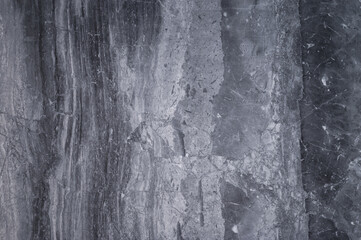 Grey marble effect textured background.