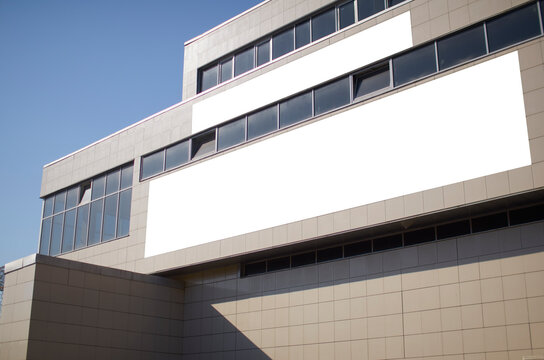 Space for two banners on a modern building.