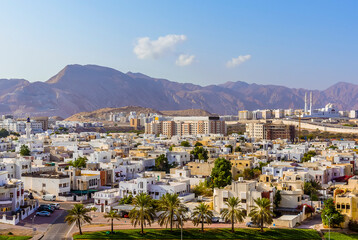 A view across Muscat, Oman towards the distant mountains in late summer