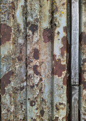 Colored rusty stained metal wall texture pattern