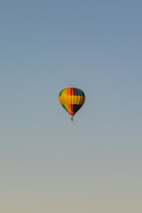 Hot air balloon in the sky at sunset