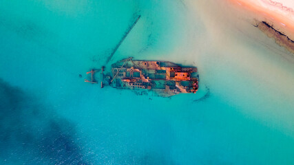 Drone pics over a shipwreck next to a tropical beach in Epanomi, Macedonia, Greece