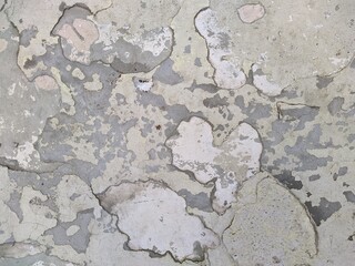 old and battered in places cracked white concrete