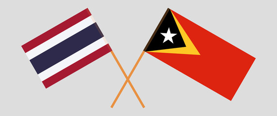 Crossed flags of East Timor and Thailand