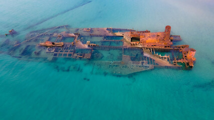 Drone pics over a shipwreck next to a tropical beach in Epanomi, Macedonia, Greece