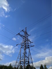 power transmission tower against the blue sky background