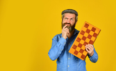 Man playing chess. back to school. chess pieces and board. competition success play. strategy,...
