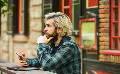 hipster inspired to work. agile business. mature student working on computer. go shopping on cyber...