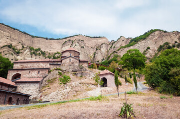 Shio Mgvime monastery on the background of rocks.