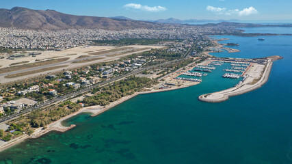 Aerial drone photo of Marina of Agios Kosmas and abandoned former international airport of Athens...