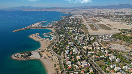Fototapeta premium Aerial drone photo of Marina of Agios Kosmas and abandoned former international airport of Athens in Elliniko area, South Athens riviera, Attica, Greece