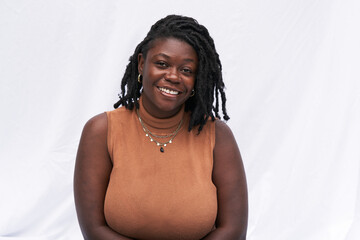 Portrait smiling plus size Black woman with locs