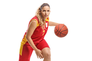 Young female basketball player leading a ball - Powered by Adobe