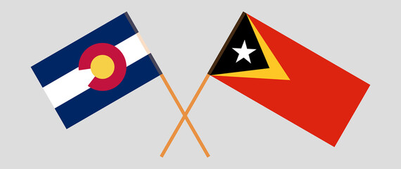 Crossed flags of East Timor and The State of Colorado