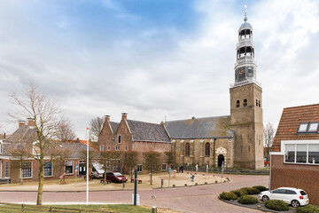 Obraz premium Townscape of Hindeloopen, Netherlands with church