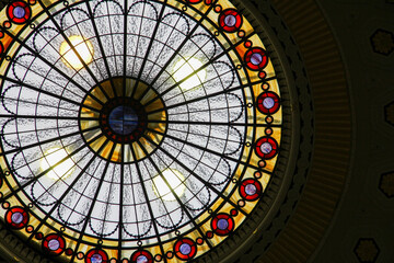 Stained glass of a spectacular church dome with lots of light and different colors