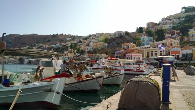 Rhodes, Greece : Several ships docked in the port of symi island usually used by fisherman and as transportation of supply, the island is located in the mediterranean sea