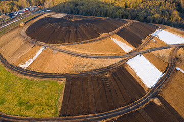 Above view of recultivated landfill - obrazy, fototapety, plakaty