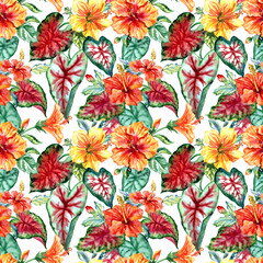 Seamless pattern of tropical flowers and leaves on a white background. Yellow and orange hibiscus and Caladium leaves,
  floral tropical print for fabric, home furnishings decor and various designs.