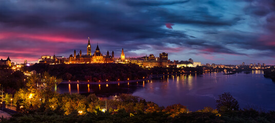 Panoramic view of Downtown Ottawa and the Parliament of Canada. Taken from Nepean Point, Ontario, Canada. Colorful Dramatic Sunset Artistic Render