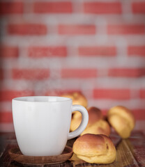 cup of coffee with cookies