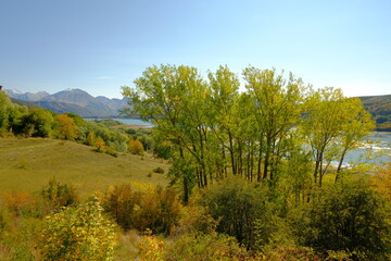 Fototapeta na wymiar Gran Sasso e Monti della Laga National Park, Lake Campotosto in the autumn