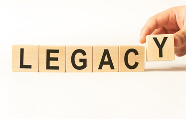 Word legacy made with wood building blocks, stock image