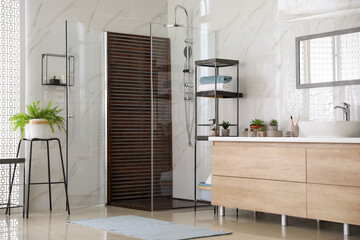 Bathroom interior with shower stall, counter and houseplants. Idea for design